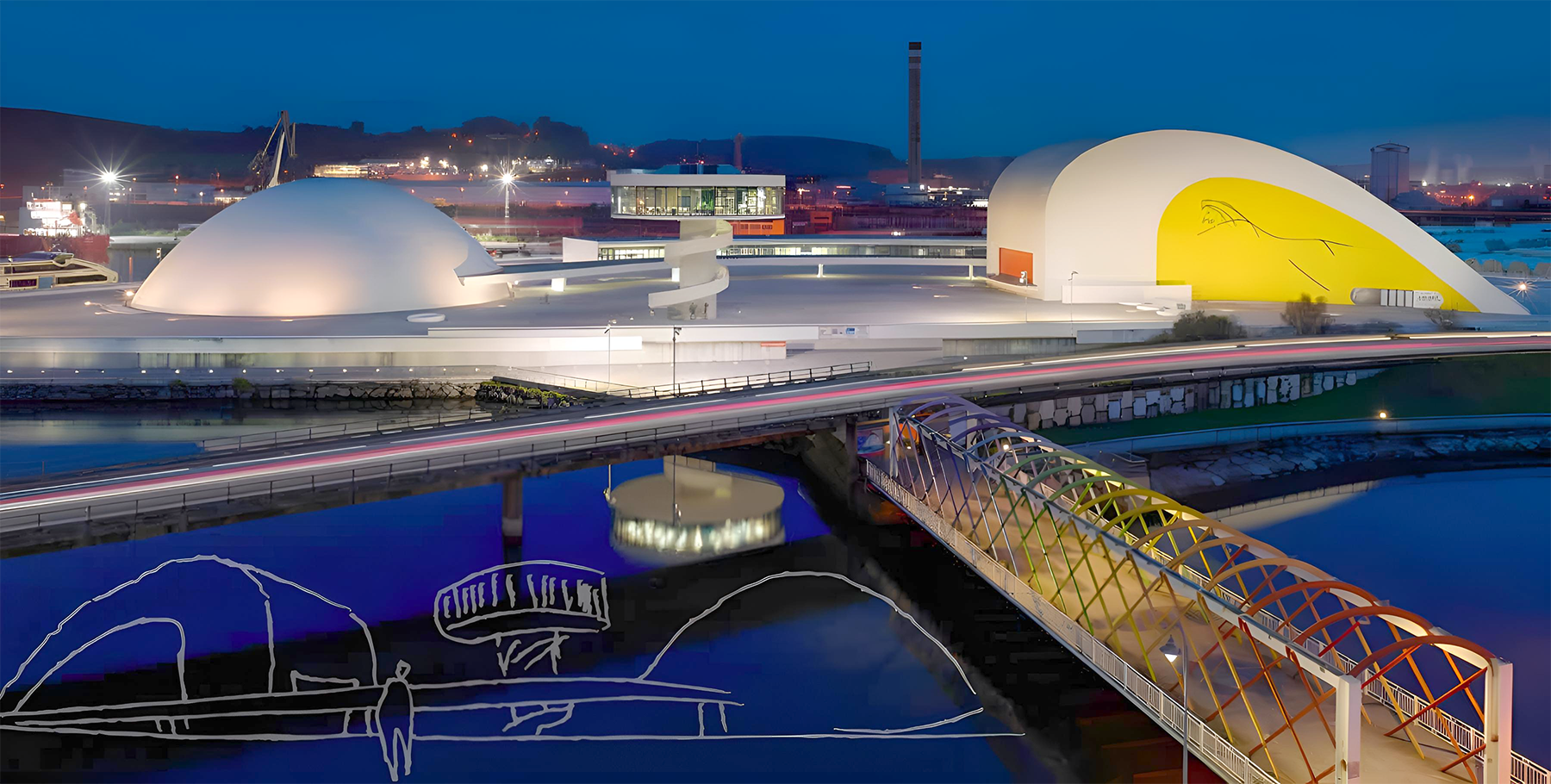 Vista nocturna del Centro Internacional Oscar Niemeyer en Avilés, con sus cúpulas iluminadas y el puente sobre la ría